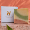 TRIPLE CLAY Bar of soap with a Fynakaa box on a stone surface with a natural background