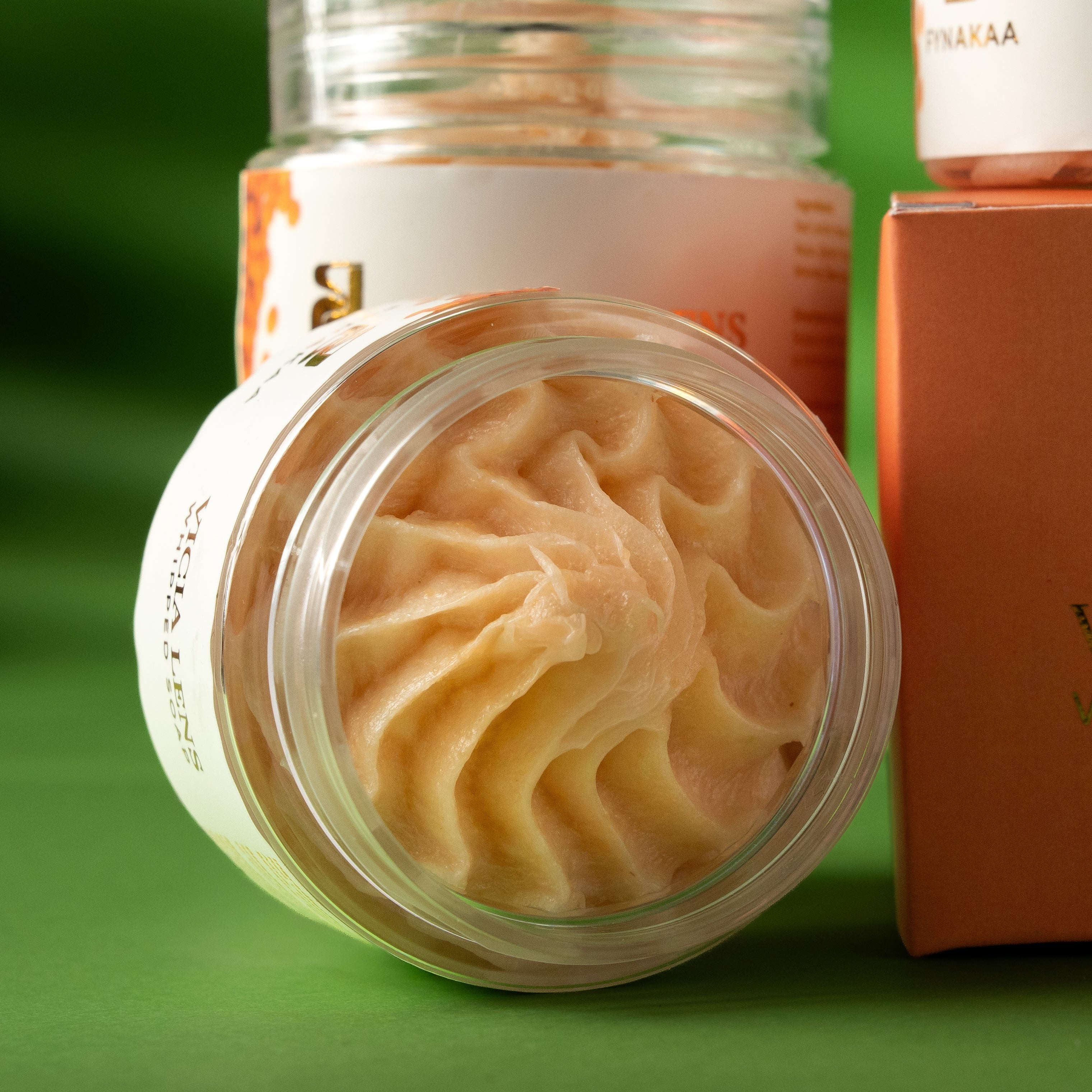Fynakaa Vicia Lens soap with packaging on a green background